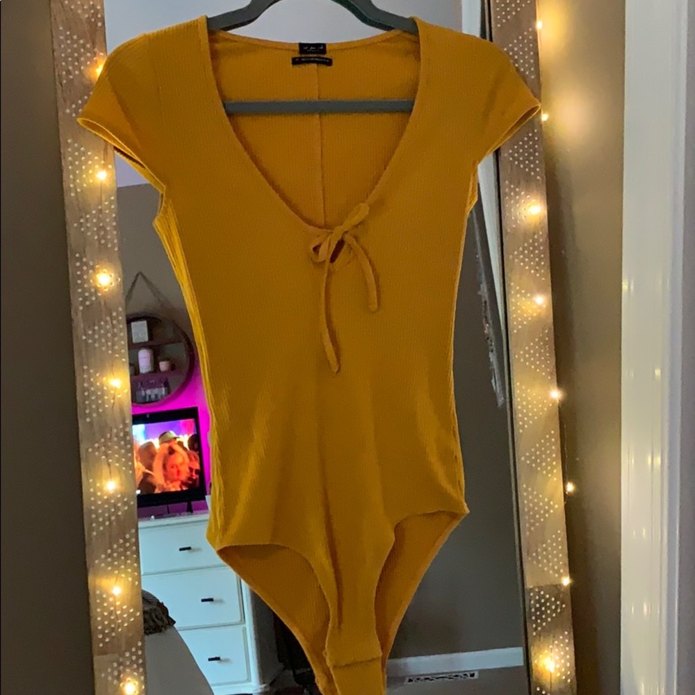 Yellow Keyhole Bodysuit from Urban Outfitters